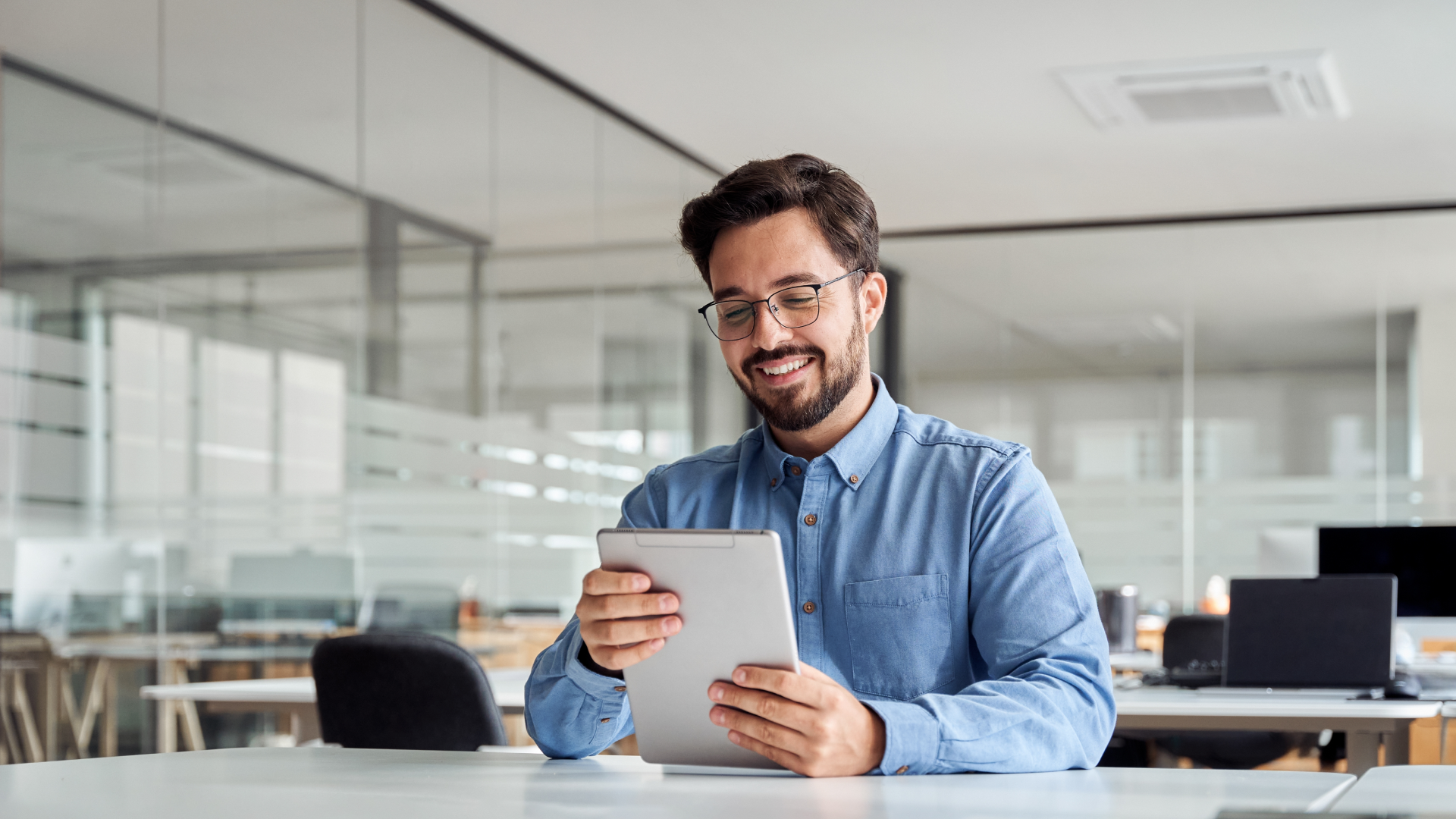 man at desk in office